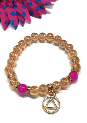 Peach Iridescent Bracelet With Gold Tone Accents - AA