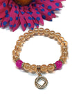Peach Iridescent Bracelet With Gold Tone Accents - NA